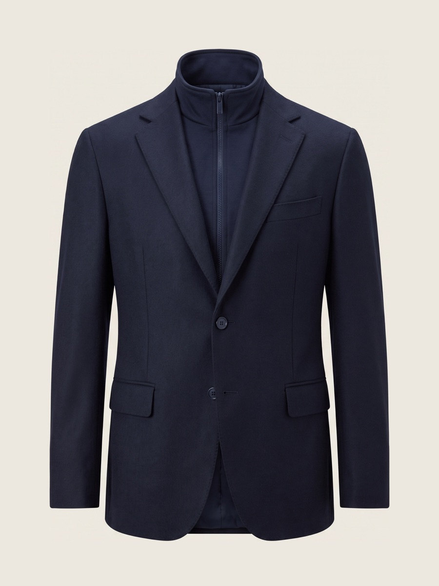 Navy jacket with zip bib, studio packshot
